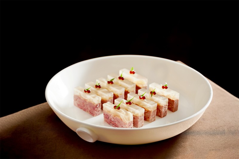 Black vinegar crystal lamb tendon meat