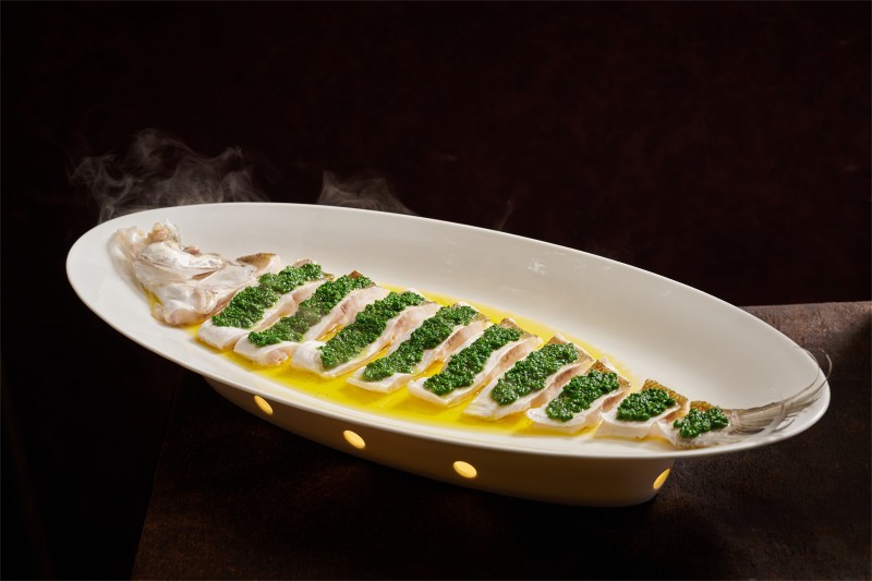 Steamed white fish with scallions